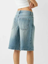 High waist light wash denim Bermuda shorts with distressed pockets