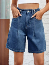 High waist denim shorts with pleated Bermuda style and pockets