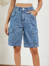 High waist denim shorts in light wash with elastic waistband and pockets