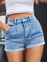 High waist light blue denim shorts with pleats and cuffed hems
