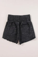 High waist raw hem denim shorts in acid wash black with frayed edges