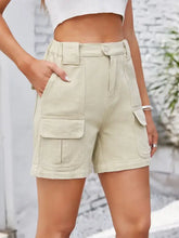 High waist washed denim shorts with beige cargo pockets
