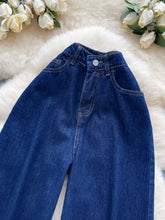 Dark blue high waist wide leg denim jeans with button closure and classic stitching for a stylish fit