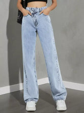 Light-wash denim high waist wide leg jeans featuring a relaxed straight-cut silhouette and classic stitching details
