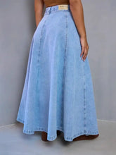 Light blue high-waisted denim skirt with maxi length and straight hem made from denim material