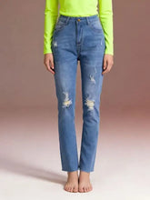 High-waisted blue denim distressed jeans with ripped details on knees and thighs for a stylish casual look