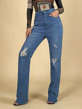 High-waisted distressed blue denim jeans with ripped knees featuring a high-rise fit and casual style