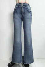 High-waisted flare leg jeans in faded blue denim with a flared silhouette recommend measuring for fit accuracy