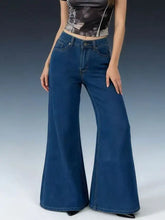 Dark blue denim high-waisted flare leg jeans with classic five-pocket design and tailored fit
