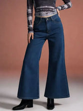 Dark blue denim high-waisted flare leg jeans with wide-leg cut classic five-pocket design and belt loops