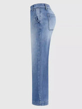 High-waisted relaxed fit jeans in light-wash denim with a straight-leg cut and classic stitching detail