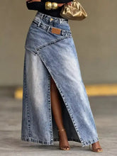 High-waisted slit denim skirt in light blue with asymmetrical design front slit and classic stitching details