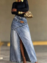 High-waisted slit denim skirt in light blue with asymmetrical design and classic stitching made of denim material