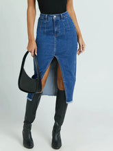 High-waisted mid-thigh length blue denim skirt with front slit and frayed hem stylish slit denim skirt