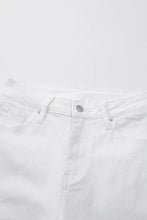 White denim high-waisted straight leg jeans with a classic button closure and subtle stitching details
