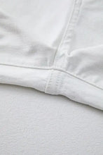 White denim high waisted straight leg jeans fabric with visible stitching along the straight leg cut seam