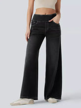 Black high-waisted wide-leg jeans made of denim with an elastic waistband for a comfortable fit