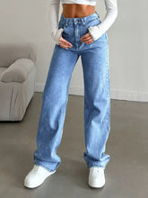Light-wash blue high-waisted wide leg jeans with a relaxed straight-cut silhouette and classic five-pocket design
