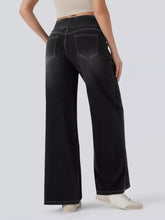 Black high-waisted wide-leg jeans made of denim with subtle stitching details and a high waist design