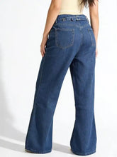 Blue denim high-waisted wide leg jeans with belt loops and back pockets shown from the back side