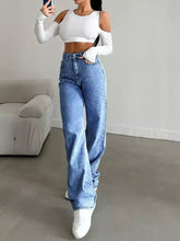 High-waisted wide leg jeans in light blue denim with a straight-leg cut and classic stitching detail