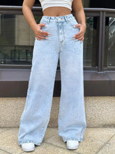 Light-wash denim high-waisted wide-leg jeans with a relaxed straight-cut silhouette for casual wear