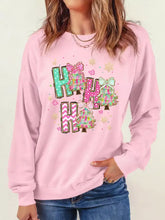 Pink slightly stretchy long-sleeved ho ho ho christmas tree graphic pullover sweatshirt machine wash care instructions