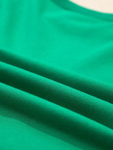 Holly jolly towel embroidered christmas holiday sweatshirt in soft vibrant green fabric with smooth texture care instructions included