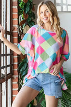 Woman in Hopely color block waffle oversized t-shirt and denim shorts