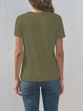 Olive green short sleeve Horse Round Neck T-Shirt with blue jeans