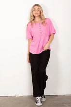 Hot pink Henley shirt with half button and twisted sleeve band