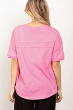 Hot pink women’s Henley shirt with half button and twisted sleeve band
