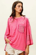 Hot pink high-low washed t-shirt with textured pocket for women