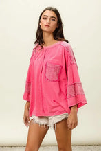 Womens hot pink high-low washed t-shirt with textured pocket