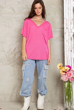 Hot pink loose fit V-neck t-shirt with chest pocket in knit slub fabric