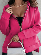 Womens hot pink zip-up slit hoodie with front pockets