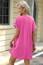 Hot pink t-shirt dress with short sleeves, pockets, relaxed fit, machine wash cold