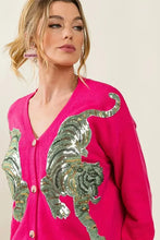 Vibrant hot pink v-neck sweater cardigan with tiger sequin patch