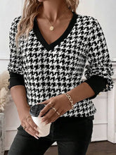 Black and white houndstooth v neck buttoned cuffs sweater