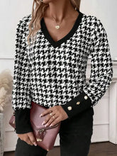 Houndstooth V neck sweater with buttoned cuffs and gold buttons