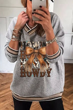 Gray oversized howdy graphic v-neck sweatshirt with brown bow leopard accents striped ribbing machine wash cold