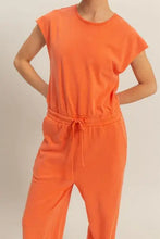Back view of HYFVE keyhole round neck cap sleeve orange drawstring jumpsuit