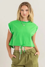Hyfve drawstring hem crop top in bright green over white tank
