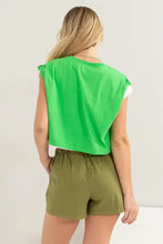 Hyfve drawstring hem crop top in bright green with relaxed fit olive shorts