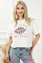 Womans short-sleeved white In Dolly We Trust round neck t-shirt