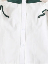 Infant long sleeve ruffled collar top in white with green accents and drawstring hem