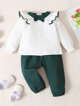 Infant white long-sleeve ruffled collar top with matching green pants set