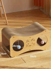 Light wood cat scratcher lounge with toy balls and curved cushioned top