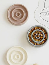 Interactive slow feeder pet bowl with beige ceramic spiral channels