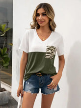 Ivy Lane color block short sleeve tee with zebra print pocket
